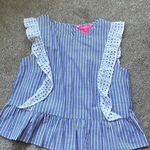 Adorable blue and white stripe peplum top with the cutest ruffle.